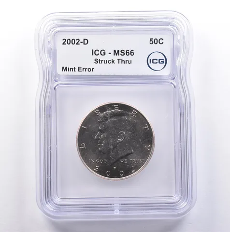 2002-D Kennedy Half Dollar Mint Error Struck Thru MS66 ICG *9076