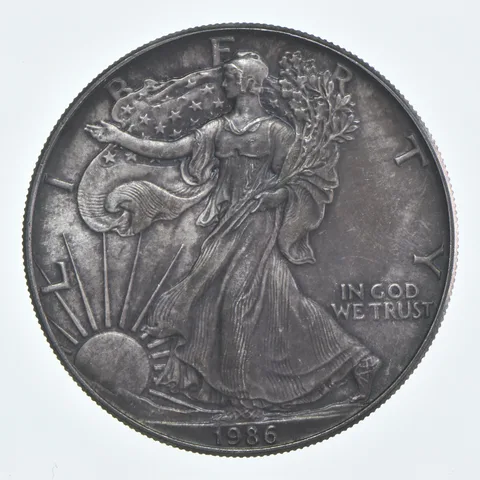 Beautiful Toned - 1986 American Silver Eagle 1 Troy Oz .999 Fine Silver *948