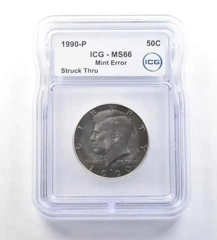 1990-P Kennedy Half Dollar Mint Error Struck Thru MS66 ICG a0681
