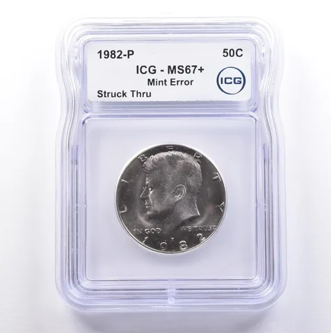 1982-P Kennedy Half Dollar Mint Error Struck Thru MS67+ ICG *9080