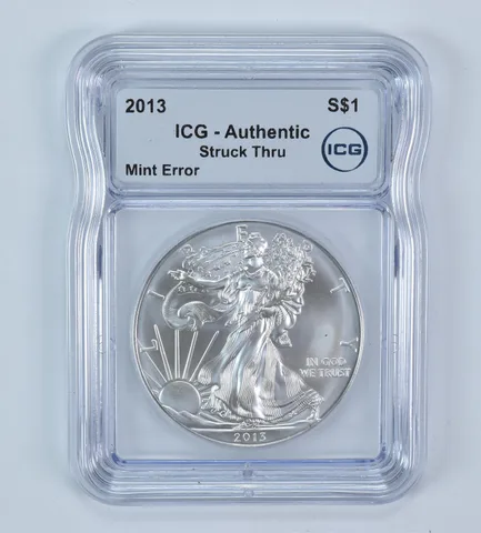 2013 American Silver Eagle Mint Error Struck Thru Authentic ICG