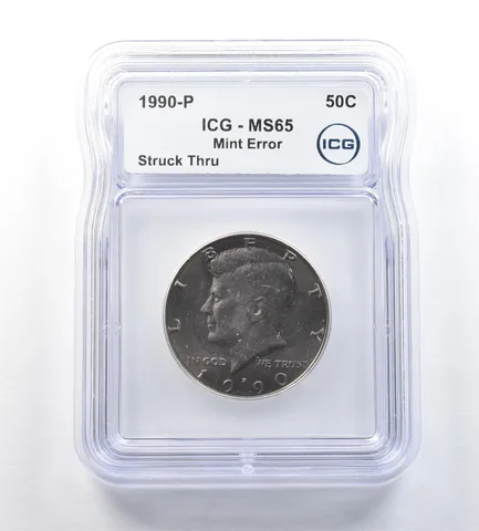 1990-P Kennedy Half Dollar Mint Error Struck Thru MS65 ICG *0684