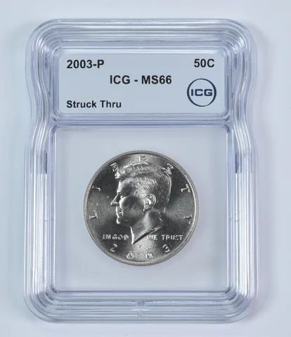 2003-P Kennedy Half Dollar Mint Error Struck Thru MS66 ICG *9334