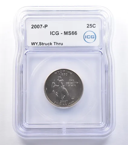 2007-P Washington State Quarter Wyoming Mint Error Struck Thru MS66 ICG *9578