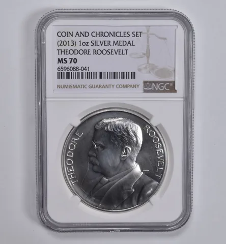 (2013) Silver Medal Theodore Roosevelt Coin & Chronicles 1 oz MS70 NGC