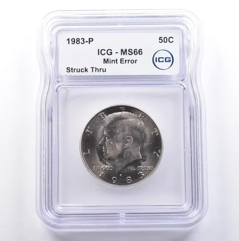 1983-P Kennedy Half Dollar Mint Error Struck Thru MS66 ICG *9102