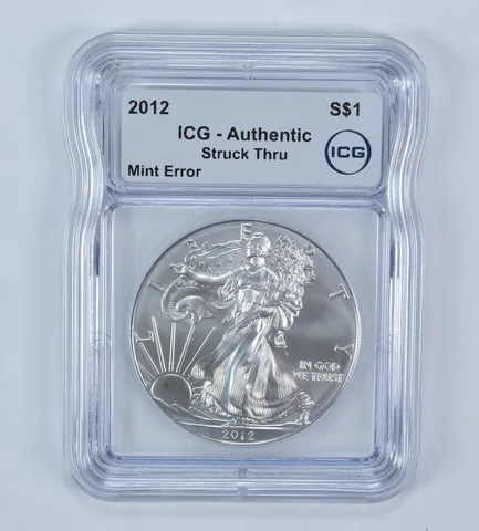 2012 American Silver Eagle Mint Error Struck Thru Authentic ICG