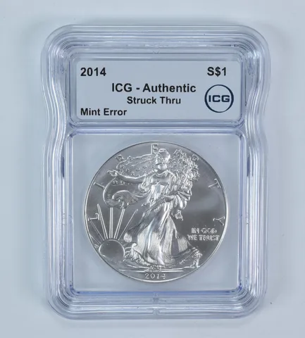 2014 American Silver Eagle Mint Error Struck Thru Authentic ICG