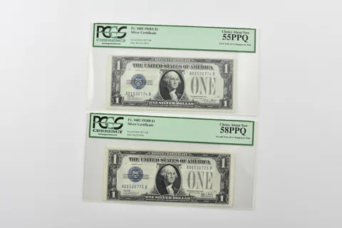 (2) PCGS AU 55/58 PPQ $1 1928-A/B Silver Cert Changeover Pair Fr 1601/1602 *8305