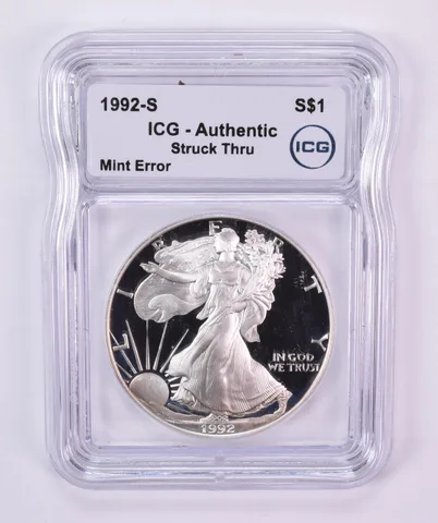 1992-S American Silver Eagle Mint Error Struck Thru Authentic ICG