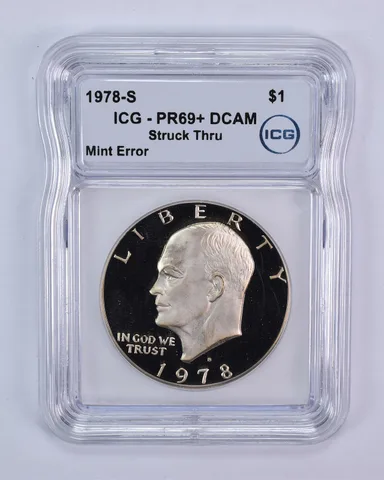 1978-S Eisenhower $1 Mint Error Struck Thru PR69+ DCAM ICG