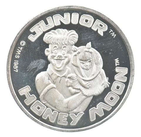1987 1 Troy Oz Silver Round Cartoon Celebrities Junior Honey Moon *0734