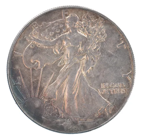 Beautiful Toned - 1986 American Silver Eagle 1 Troy Oz .999 Fine Silver *044