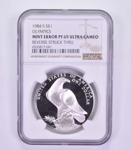 Mint Error PF69 UCAM 1984-S Los Angeles Olympics - REV Struck Thru - NGC *9610