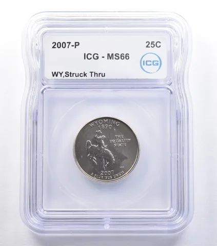 2007-P Washington State Quarter Wyoming Mint Error Struck Thru MS66 ICG *9584