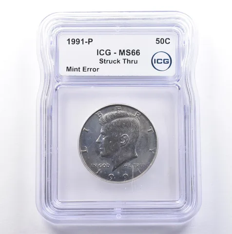 1991-P Kennedy Half Dollar Mint Error Struck Thru MS66 ICG *9073