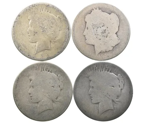 Lot (4) 1928/1926/1922/1878 Peace/Morgan Silver Dollar *0015