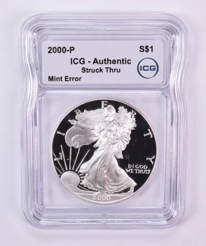 2000-P American Silver Eagle Mint Error Struck Thru Authentic ICG