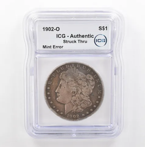 1902-O Morgan Silver $1 Mint Error Struck Thru Authentic ICG Nice Tone *5381