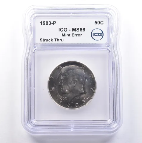 1983-P Kennedy Half Dollar Mint Error Struck Thru MS66 ICG *9101