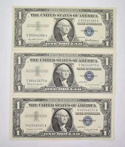 (3) $1 1957 (_)+A+B Silver Certificates Blue Seal Uncirculated (set of 3)
