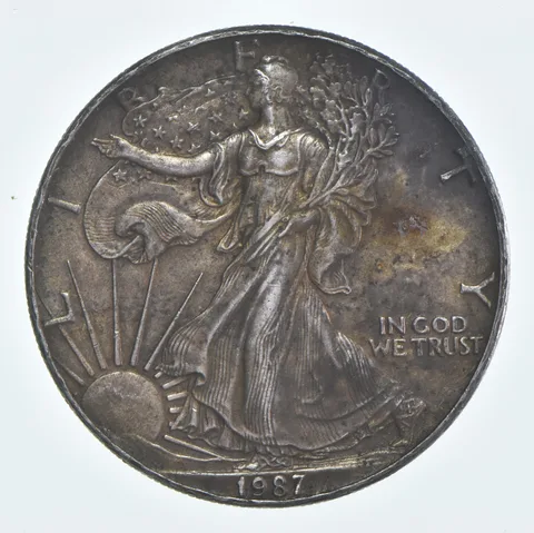 Beautiful Toned - 1987 American Silver Eagle 1 Troy Oz .999 Fine Silver *941