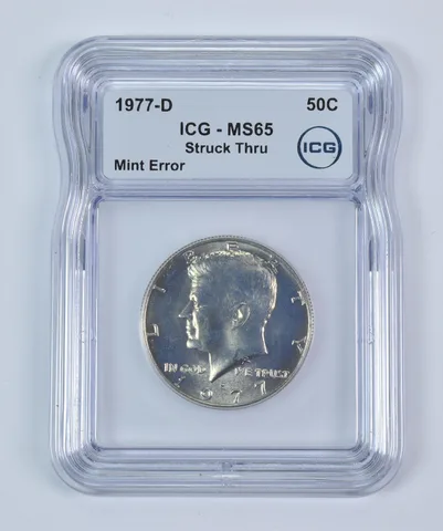 1977-D Kennedy Half Dollar Mint Error Struck Thru MS65 ICG *9341