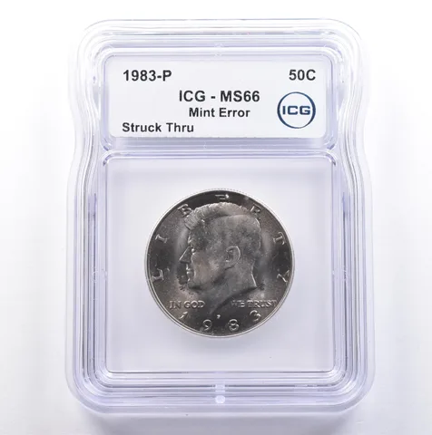 1983-P Kennedy Half Dollar Mint Error Struck Thru MS66 ICG *9104