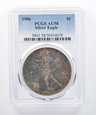 1986 American Silver Eagle AU58 PCGS Blue/Green Tone *8399