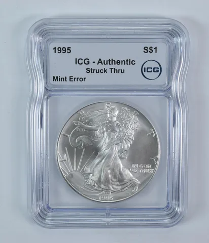 1995 American Silver Eagle Mint Error Struck Thru Authentic ICG