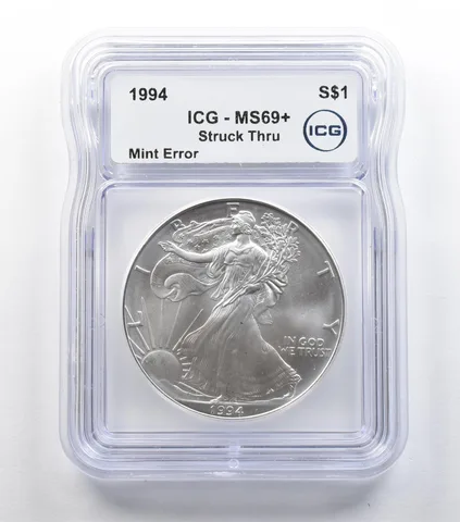1994 American Silver Eagle Mint Error Struck Thru MS69+ ICG *5439