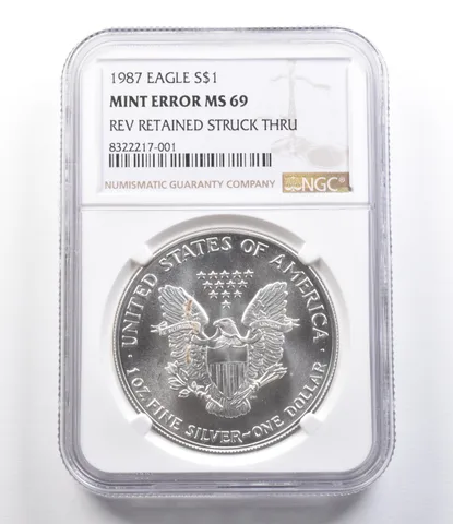 1987 Silver Eagle Mint Error Reverse Retained Struck Thru MS69 NGC a2539
