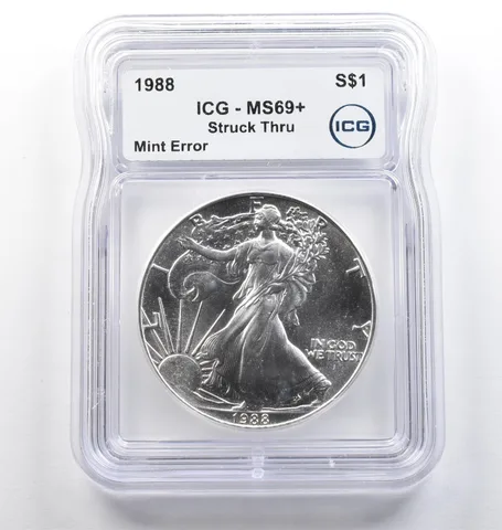 1988 American Silver Eagle Mint Error Struck Thru MS69+ ICG *5781