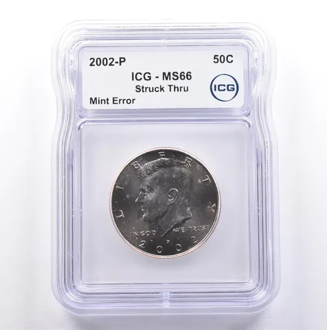 2002-P Kennedy Half Dollar Mint Error Struck Thru MS66 ICG *9077