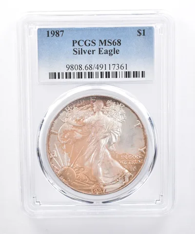 1987 American Silver Eagle MS68 PCGS Purple/Orange Tone *8477