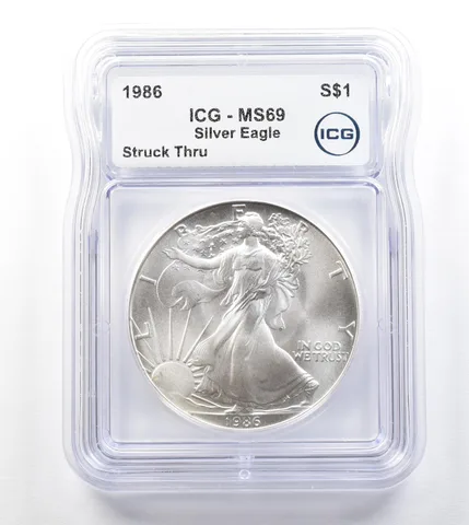 1986 American Silver Eagle Mint Error Struck Thru MS69 ICG a3298