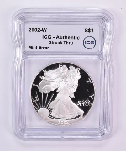 2002-W American Silver Eagle Mint Error Struck Thru Authentic ICG