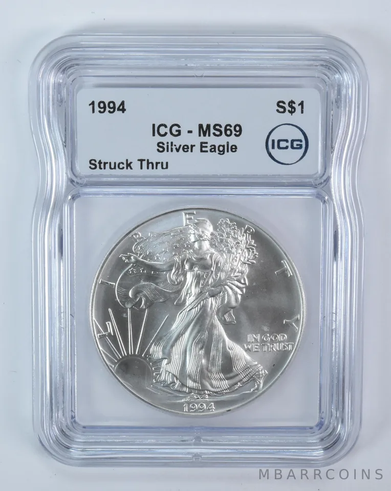 1994 American Silver Eagle Mint Error Struck Thru MS69 ICG