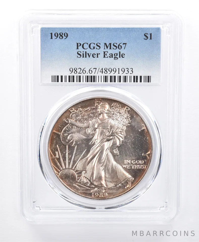 1989 American Silver Eagle MS67 PCGS Yellow Tone *8600