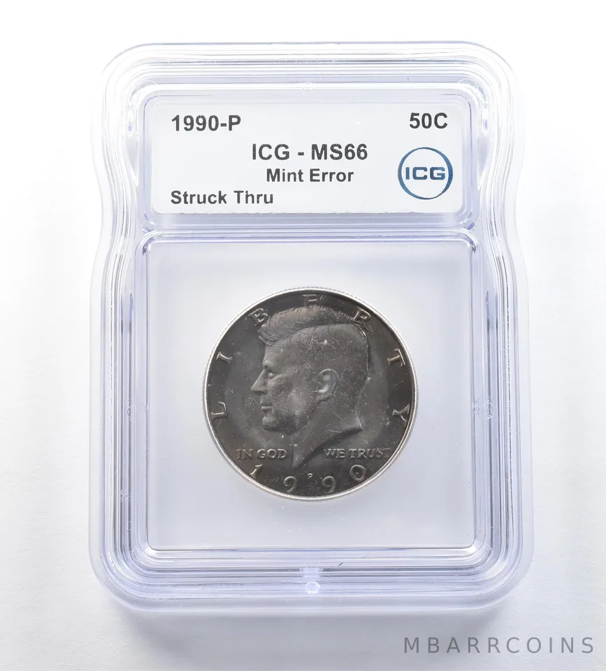 1990-P Kennedy Half Dollar Mint Error Struck Thru MS66 ICG a0681