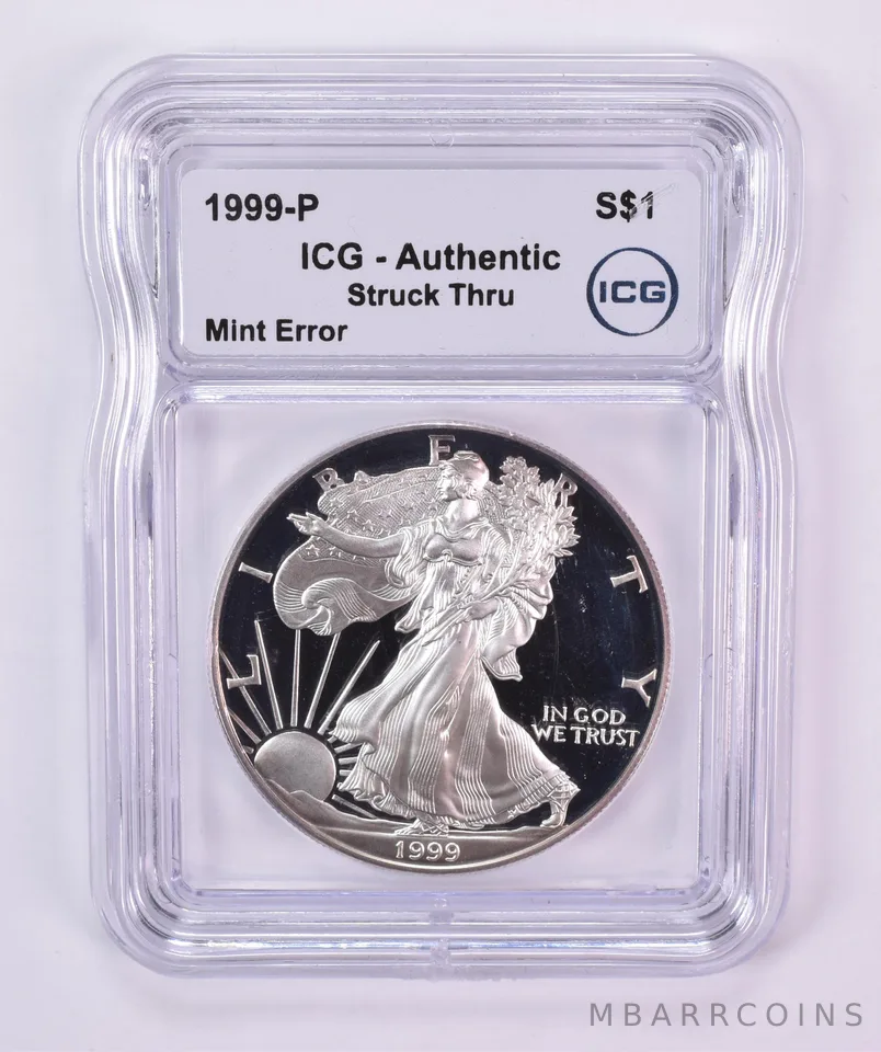 1999-P American Silver Eagle Mint Error Struck Thru Authentic ICG
