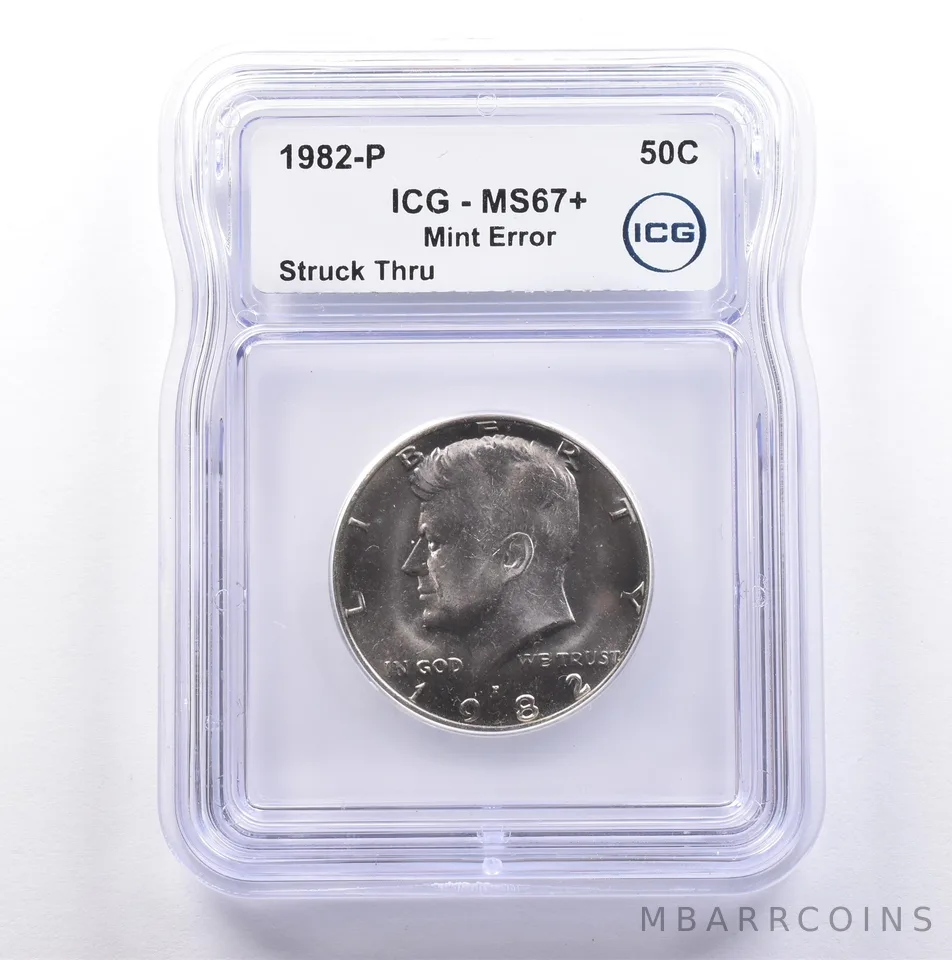1982-P Kennedy Half Dollar Mint Error Struck Thru MS67+ ICG *9080