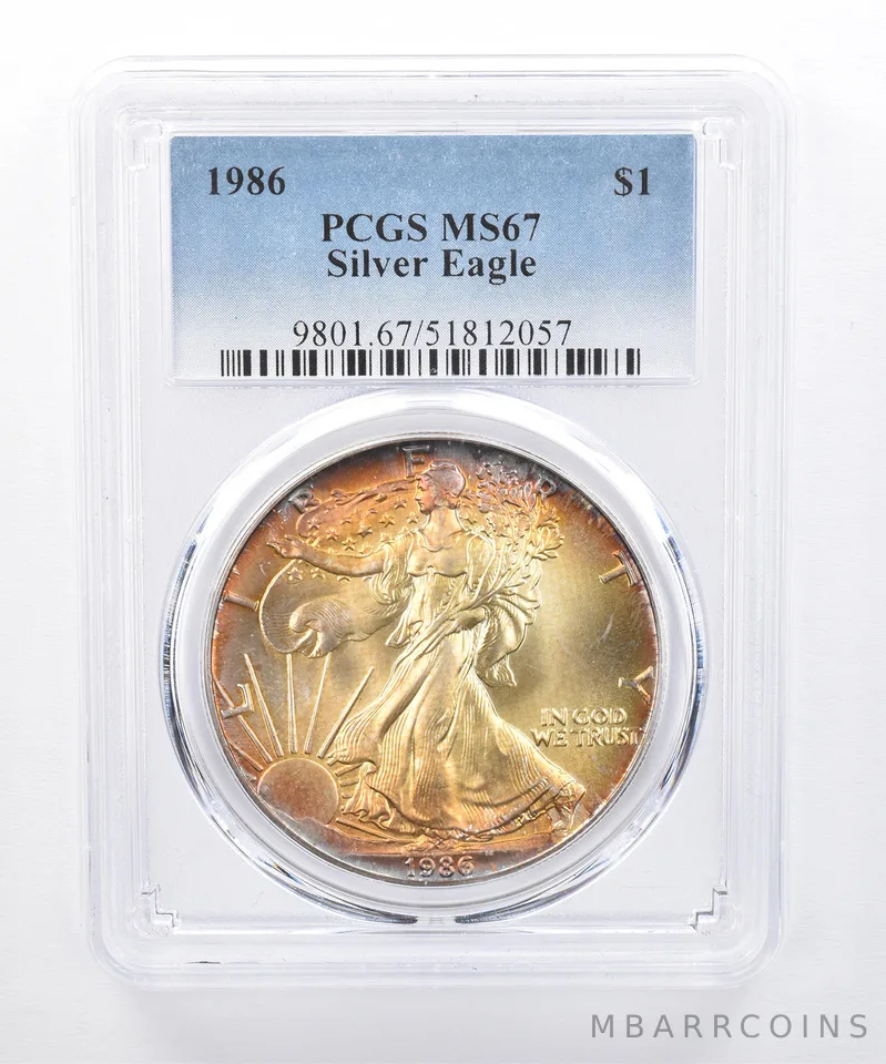 1986 American Silver Eagle MS67 PCGS Yellow Tone *8286