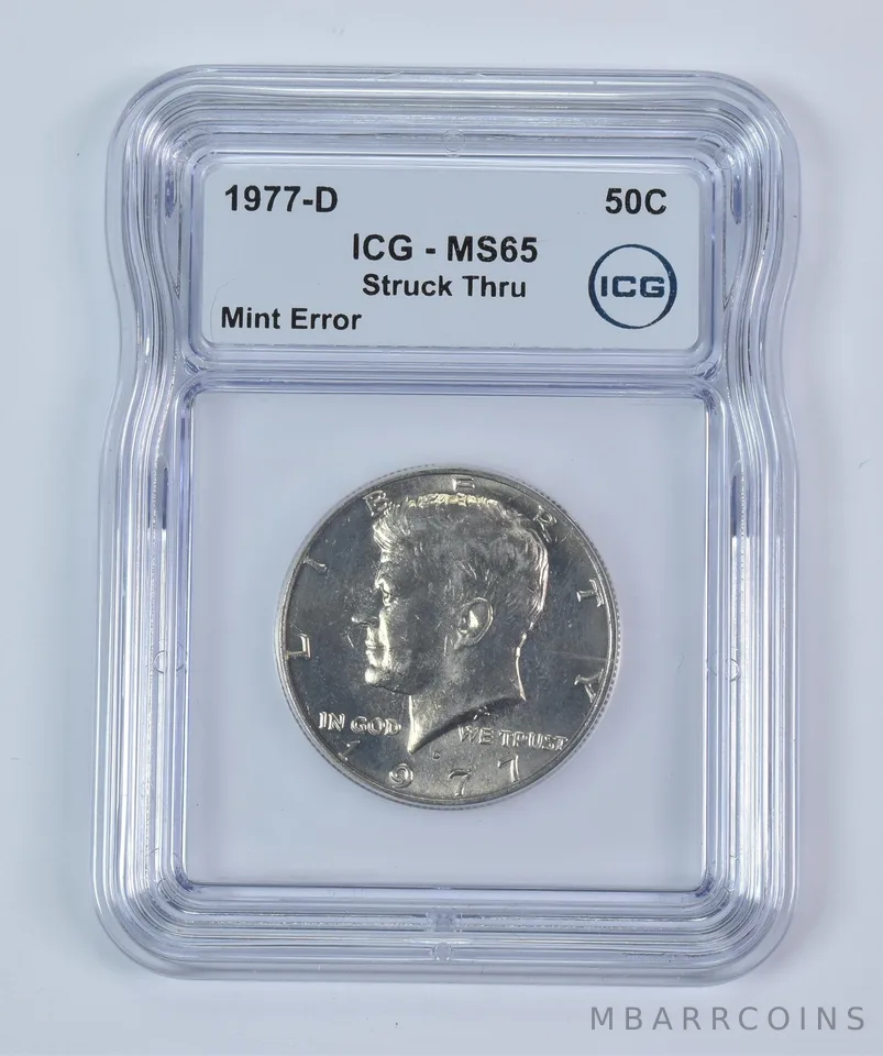1977-D Kennedy Half Dollar Mint Error Struck Thru MS65 ICG *9340