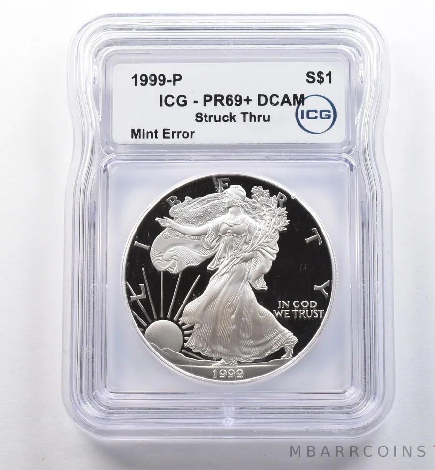1999-P American Silver Eagle Mint Error Struck Thru PR69+ DCAM ICG *2233