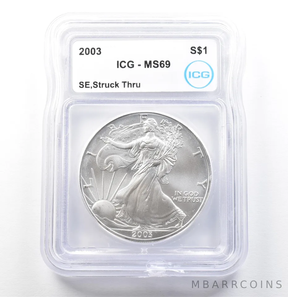 2003 American Silver Eagle Mint Error Struck Thru MS69 ICG *0033
