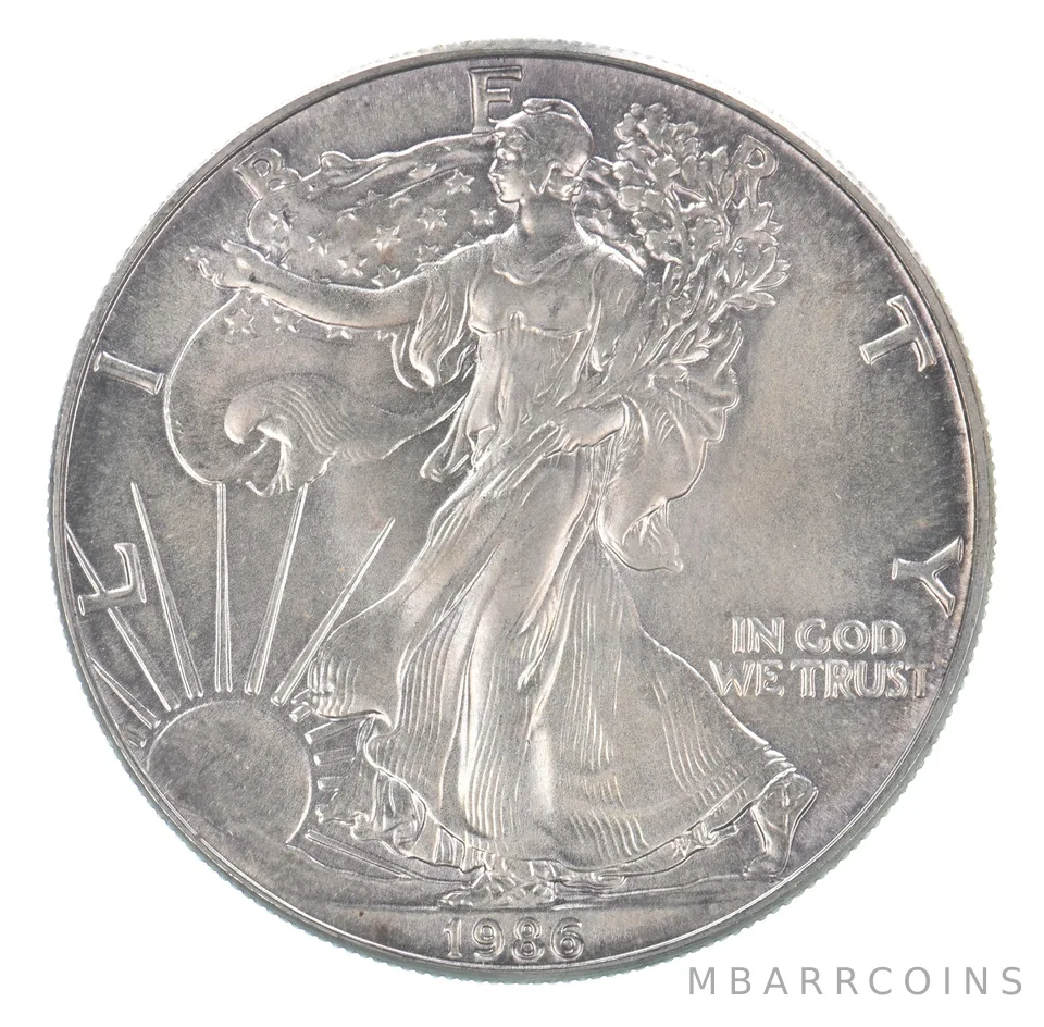 Beautiful Toned - 1986 American Silver Eagle 1 Troy Oz .999 Fine Silver *058