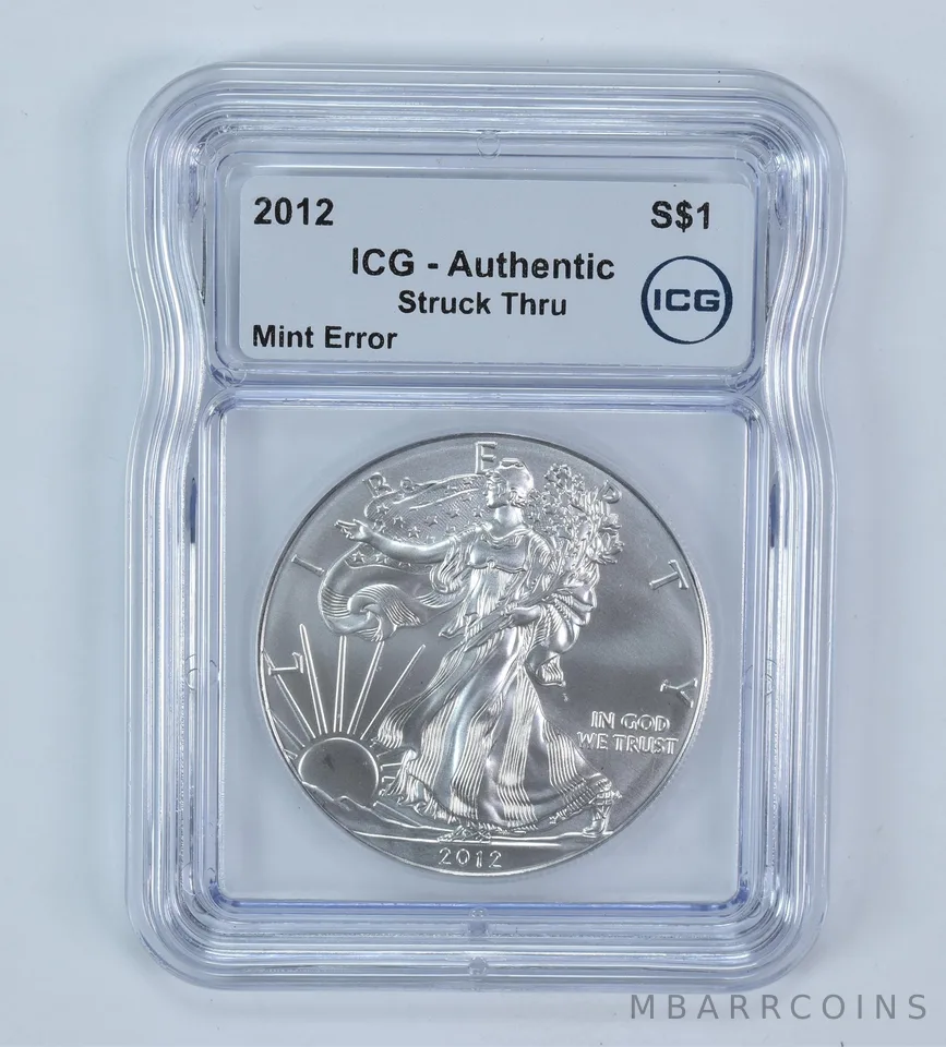 2012 American Silver Eagle Mint Error Struck Thru Authentic ICG