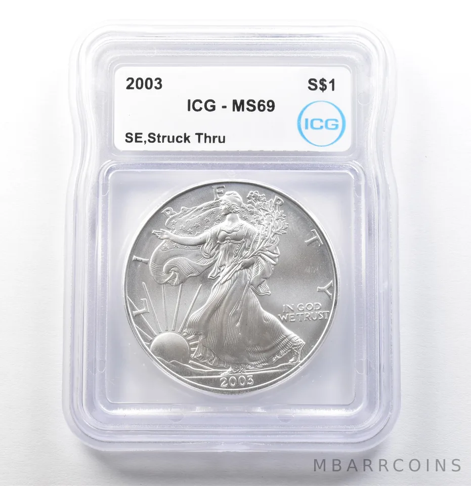 2003 American Silver Eagle Mint Error Struck Thru MS69 ICG a0036