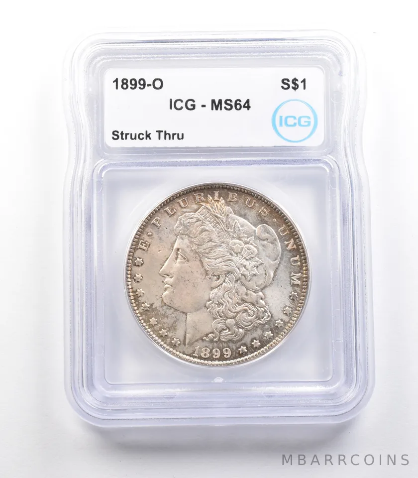 1899-O Morgan Silver Dollar Mint Error Struck Thru MS64 ICG *2427